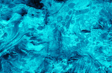 Abstract marble background of different shades of blue. Black specks of impregnation. Colors randomly intersect and mix. Different textures. Indigo, dirty blue, ultra marine etc.