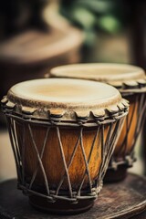 Obraz premium A pair of drums placed on a wooden table, ready for use