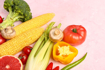Fresh ripe vegetables on pink background, closeup