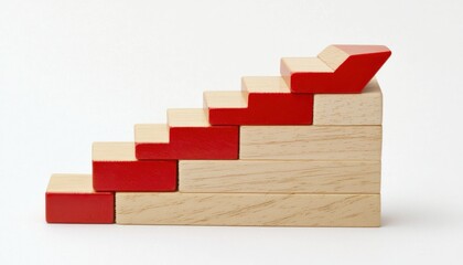 Wooden blocks arranged to form a stair-like bar graph with a red arrow pointing upwards, visually representing financial growth and success in a tangible, easy-to-understand format.