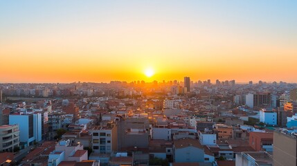 Obraz premium Panoramic sunset view over sprawling city skyline