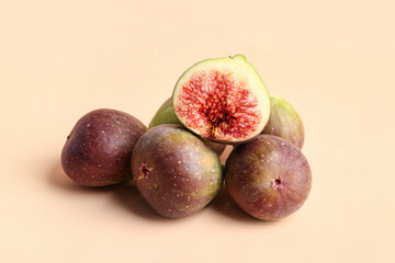 Fresh ripe figs on orange background