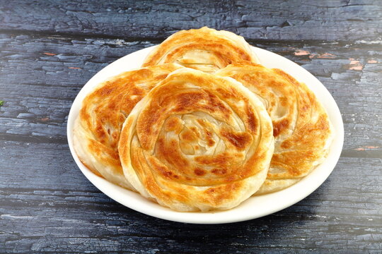 Kerala famous street foods- parotta, or porotta.