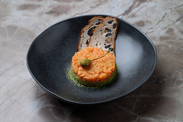 An exquisite plate showcases a creative culinary masterpiece of European cuisine
