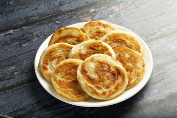 Coin parotta, porotta - a delicious homemade Kerala recipe.