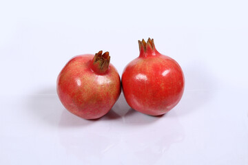 Pomegranates in white background 