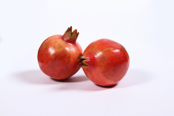 Pomegranates in white background 