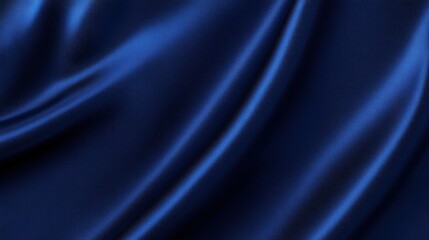 Obraz premium A close-up view of smooth, deep blue satin fabric with elegant folds and a lustrous sheen.