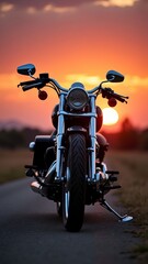 Naklejka premium A sleek black motorcycle parked on a road, its headlights gleaming in the fading light