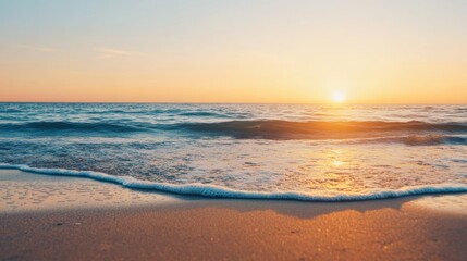 A serene beach scene at sunset with gentle waves lapping against the sandy shore, creating a peaceful and tranquil atmosphere.