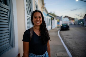 Smiling woman enjoying Praia do Frances beach in Brazil