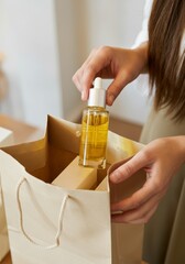 Fototapeta premium Woman packaging skincare oil bottle in eco-friendly paper bag for sustainable beauty purchase