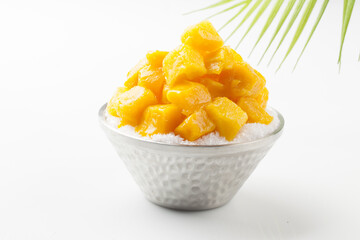 Patbingsu is a food made by crushing ice into small pieces and adding boiled red beans or sugar.