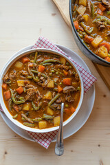 Healthy homemade stew with turkey meat, vegetables and potatoes on a plate