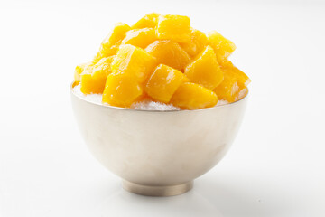 Patbingsu is a food made by crushing ice into small pieces and adding boiled red beans or sugar.