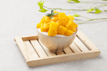 Patbingsu is a food made by crushing ice into small pieces and adding boiled red beans or sugar.