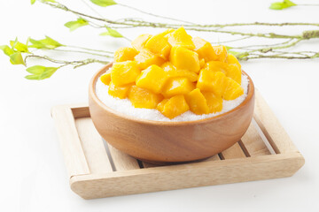 Patbingsu is a food made by crushing ice into small pieces and adding boiled red beans or sugar.