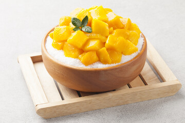 Patbingsu is a food made by crushing ice into small pieces and adding boiled red beans or sugar.