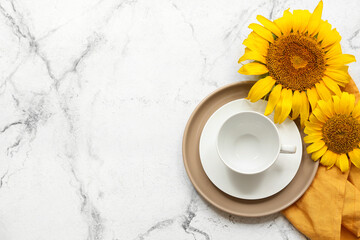 Beautiful table setting with sunflowers on white background