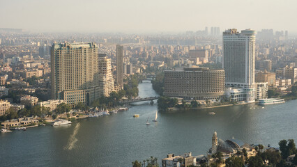Fototapeta premium Skyscrapers and bridges of Cairo as seen from Cairo TV Tower. Southern Cairo cityscape