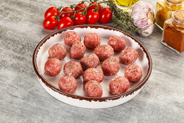Uncooked raw beef meatball minced