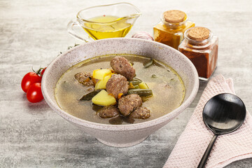 Soup with meatball and potato