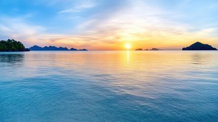 serene sunset over tranquil ocean, with silhouettes of distant islands