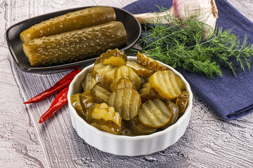 Sliced marinated cucumbers in the bowl