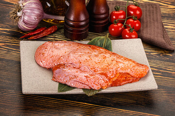 Raw marinated duck breast for cooking