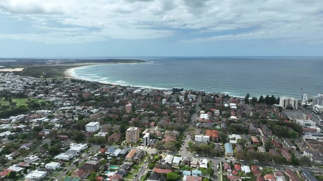 sydney coastline drone shot slow pan up with airport in background