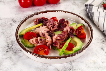 Salad with baby octopus and avocado