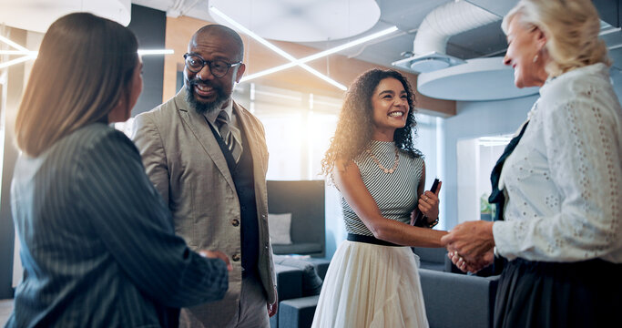 Meeting, handshake and happy business people in office for partnership, agreement and thank you. Corporate, teamwork and men and women shaking hands for collaboration, success and b2b networking