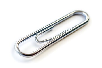 Close-up of a metallic paperclip on white.