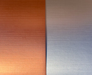 This image features two thick cardboard sheets with a textured surface, stacked on top of each...