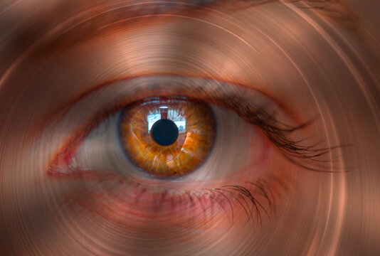 Fototapeta Hypnosis Spiral in eye with vertigo   -  Image of abstract spiral hazel eye 