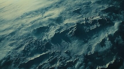 Aerial view of mountainous cloudscape, sunrise, atmospheric background, cinematic