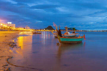 Fototapeta premium The beauty of sunrise and way of life of the fishermen of Ao Prachuap, one of the three famous bays located in Mueang District, Prachuap Khiri Khan