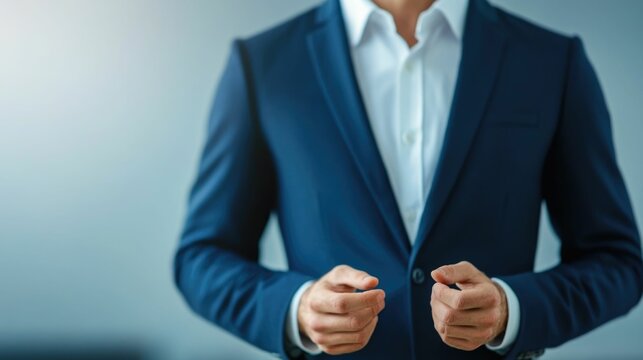 A business professional in a suit demonstrating various body language techniques and gestures for effective communication during a training session or seminar