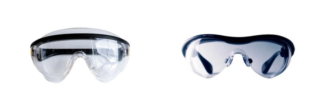 Safety glasses designed for protection are displayed on a white surface