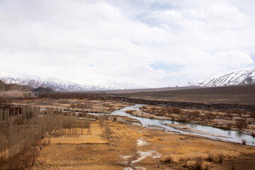 Viewpoint landscape of hight range mountain with Confluence of the Indus and Zanskar Rivers on Srinagar Leh Ladakh highway at Leh Ladakh village in Jammu and Kashmir, India at winter season