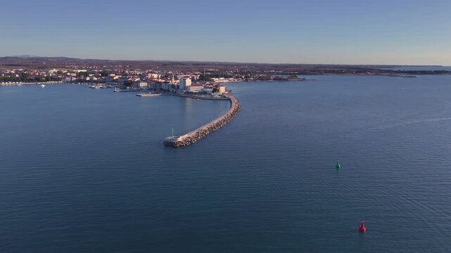 Aerial View of Umag, Croatia with Pier Stretching into the Adriatic Sea