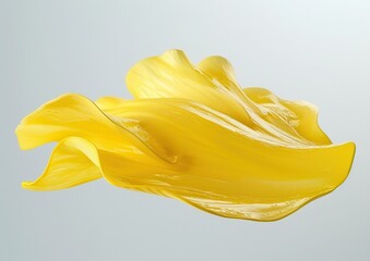 Yellow abstract wave-shaped sculpture on a soft, light blue background.