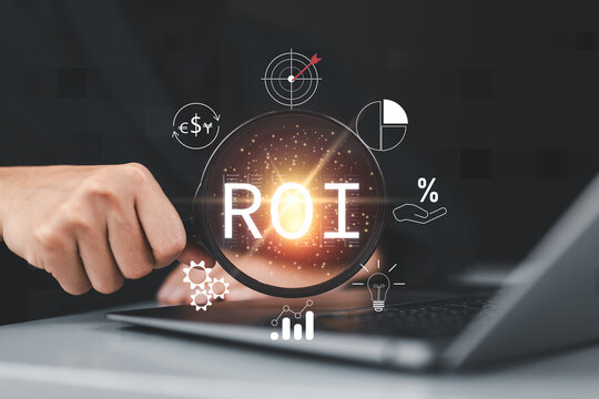 Analyzing return on investment (ROI) Concept. Businesswoman holding a magnifying glass with ROI and various financial icons, representing the analysis of return on investment and financial performance