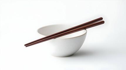 White Ceramic Bowl And Brown Wooden Chopsticks On A White Surface