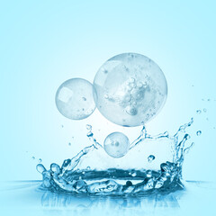 Drops of cosmetic serum and splashing water on light blue background