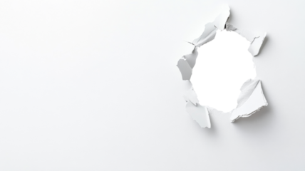 Hole in white paper with transparent background revealing checkered pattern