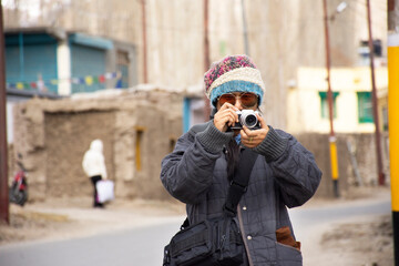 Travelers thai women journey visit and travel for take photo in Leh ladakh trip at Leh Ladakh...