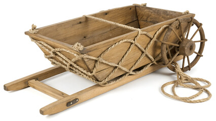 Miniature Wooden Wheelbarrow: A decorative wooden wheelbarrow with rope netting, showcasing rustic craftsmanship and miniature design.