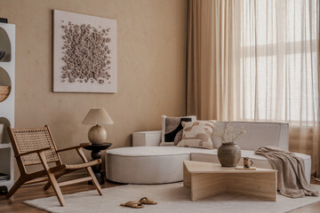 Subtle textures and a neutral color scheme define this stylish lounge. Carefully placed décor and soft lighting bring a tranquil and sophisticated ambiance.