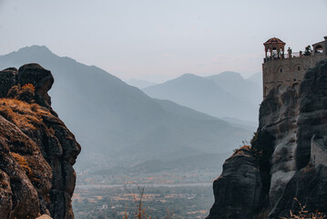 Ancient Monastery of Meteora, Greece – Breathtaking Cliffside View at Sunset